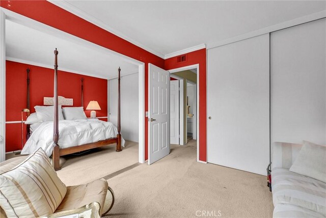 6232 E Shenandoah Ave, Orange, CA 92867 - carpeted bedroom featuring crown molding and a closet
