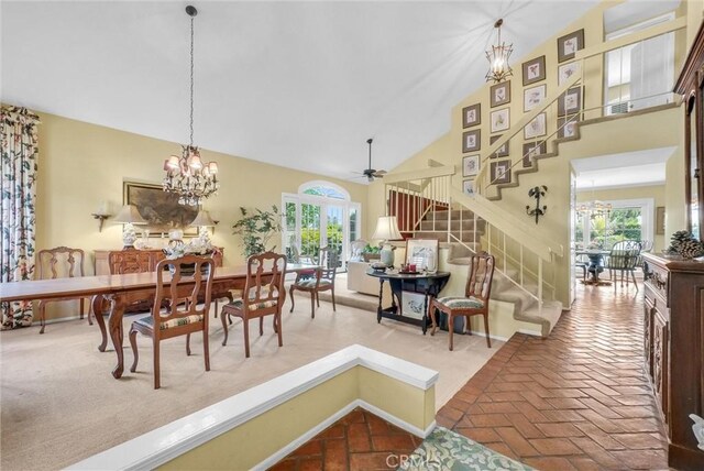 6232 E Shenandoah Ave, Orange, CA 92867 - dining space featuring stairs, a chandelier, a high ceiling, and brick floors