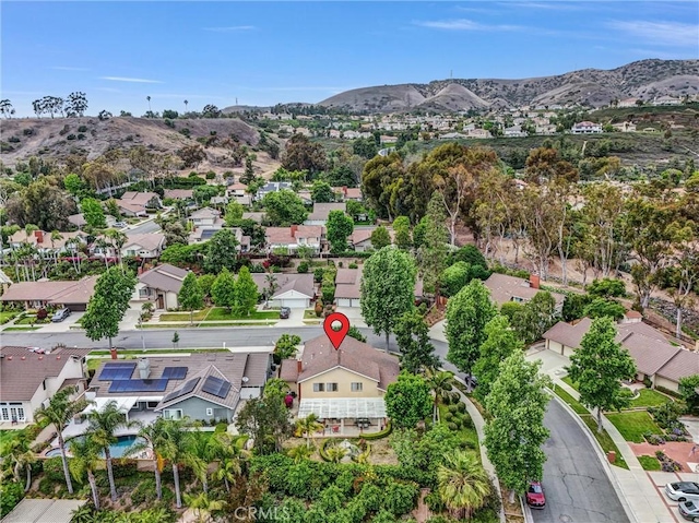 6232 E Shenandoah Ave, Orange, CA 92867 - aerial overview of property's location with nearby suburban area and a mountain backdrop