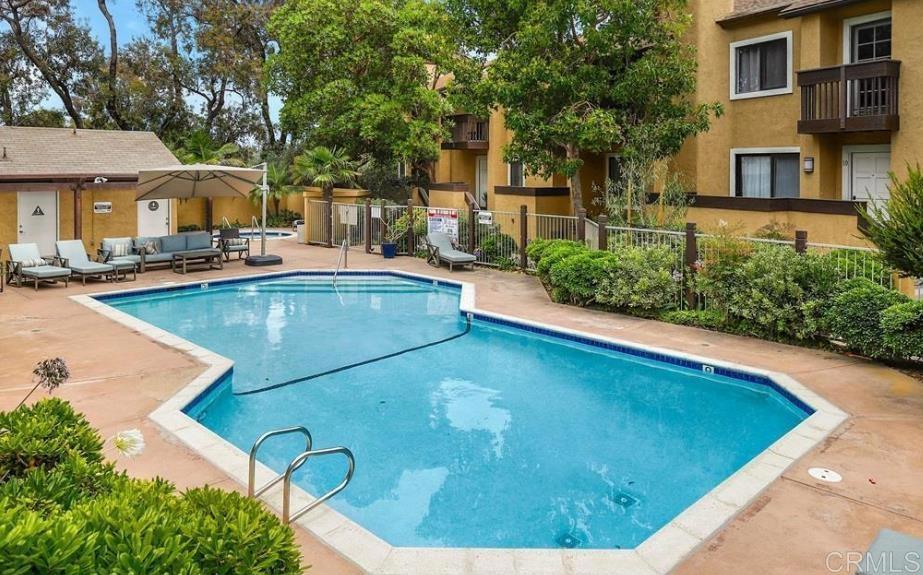 1680 N Coast Highway 101 Unit 36, Encinitas, CA 92024 - community pool with outdoor lounge area and a patio area