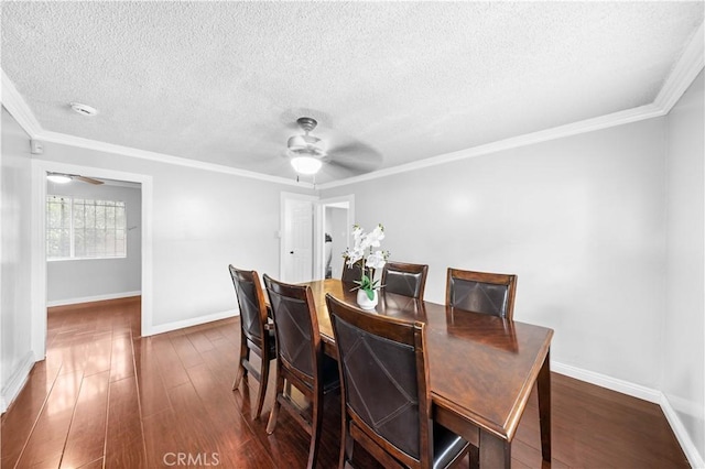 157 E 70th St, Los Angeles, CA 90003 - dining room with ceiling fan, baseboards, a textured ceiling, dark wood-style flooring, and ornamental molding