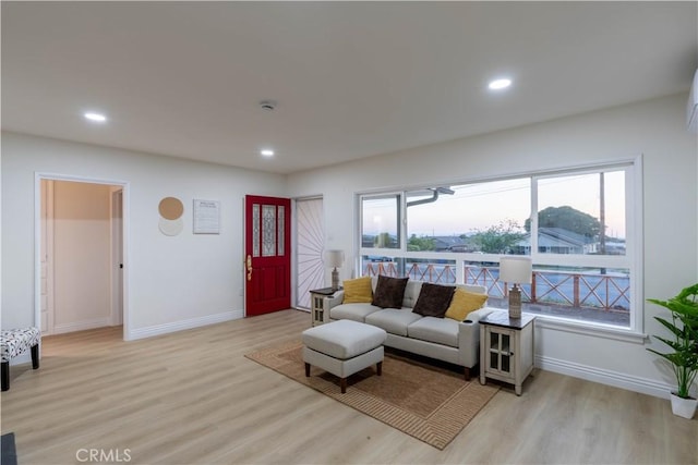 12563 3rd St, Yucaipa, CA 92399 - living area featuring light wood-style flooring, baseboards, and recessed lighting