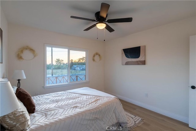 12563 3rd St, Yucaipa, CA 92399 - bedroom featuring wood finished floors, baseboards, and ceiling fan