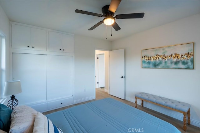 12563 3rd St, Yucaipa, CA 92399 - bedroom with baseboards, ceiling fan, and a closet