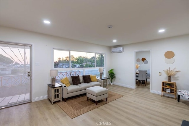 12563 3rd St, Yucaipa, CA 92399 - living area featuring a wall unit AC, light wood finished floors, baseboards, and recessed lighting