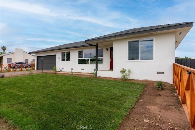 12563 3rd St, Yucaipa, CA 92399 - view of front of home with an attached garage, stucco siding, driveway, and crawl space