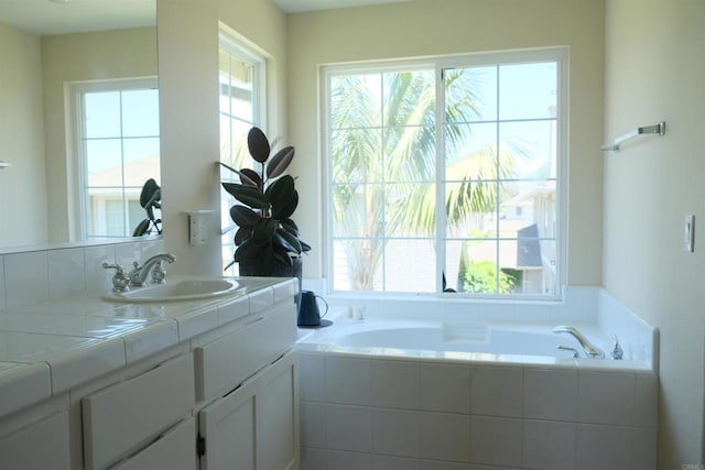 7040 Whitewater St, Carlsbad, CA 92011 - full bath featuring vanity and a garden tub