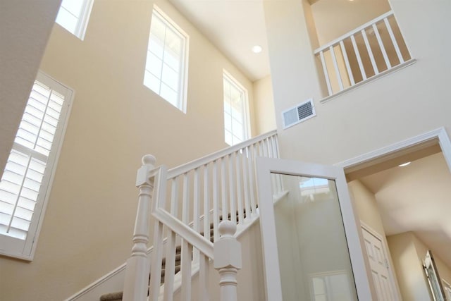 7040 Whitewater St, Carlsbad, CA 92011 - stairs with a high ceiling