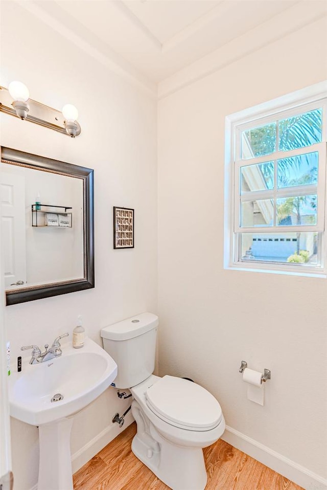 7040 Whitewater St, Carlsbad, CA 92011 - bathroom with toilet and wood finished floors