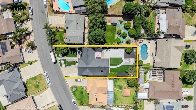 2546 Northmoor Dr, Corona, CA 92882 - aerial perspective of suburban area featuring a pool and property boundaries highlighted