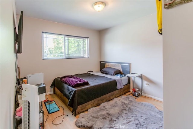 2546 Northmoor Dr, Corona, CA 92882 - bedroom featuring wood finished floors and baseboards