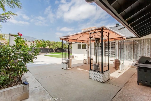 2546 Northmoor Dr, Corona, CA 92882 - fenced backyard featuring a gazebo, a patio area, and a grill