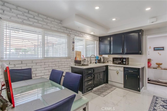 2546 Northmoor Dr, Corona, CA 92882 - kitchen with dishwasher, black microwave, a sink, light countertops, and dark cabinetry