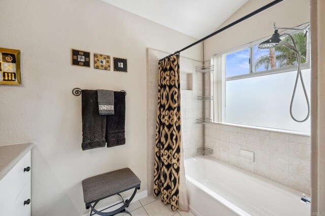 6839 Caminito Sueno, Carlsbad, CA 92009 - bathroom featuring lofted ceiling, vanity, tile patterned floors, shower / bath combination with curtain, and baseboards