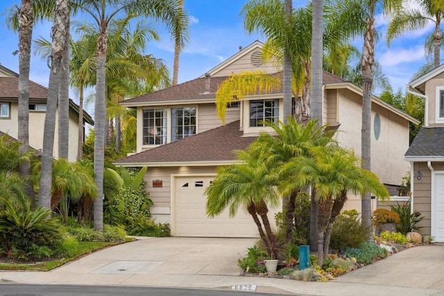 6839 Caminito Sueno, Carlsbad, CA 92009 - traditional home with driveway, roof with shingles, and a garage