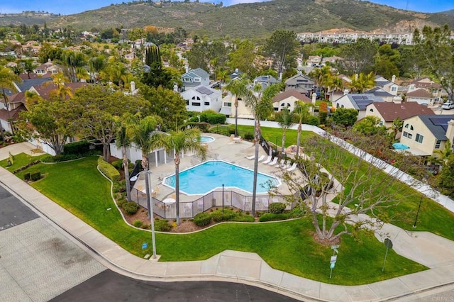 6839 Caminito Sueno, Carlsbad, CA 92009 - aerial perspective of suburban area with a mountainous background and a pool