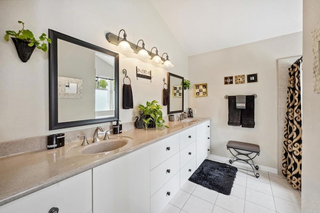 6839 Caminito Sueno, Carlsbad, CA 92009 - full bath featuring vaulted ceiling, double vanity, and tile patterned flooring