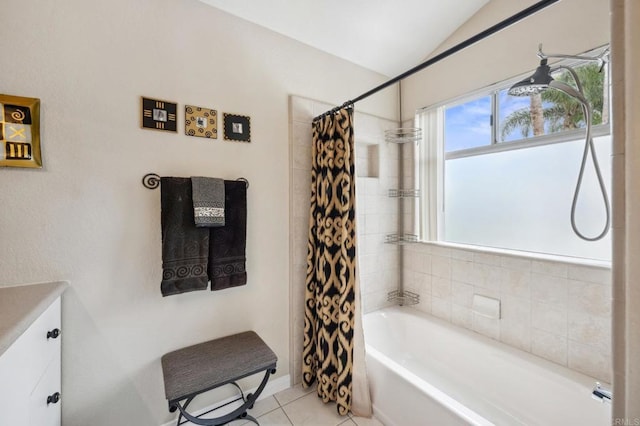 6839 Caminito Sueno, Carlsbad, CA 92009 - bathroom with vaulted ceiling, vanity, tile patterned flooring, and shower / bath combo
