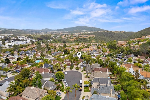 6839 Caminito Sueno, Carlsbad, CA 92009 - aerial overview of property's location with nearby suburban area and mountains