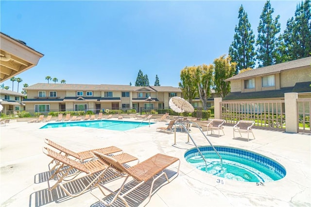 5950 Imperial Hwy Unit 48, South Gate, CA 90280 - community pool featuring a hot tub and a patio area