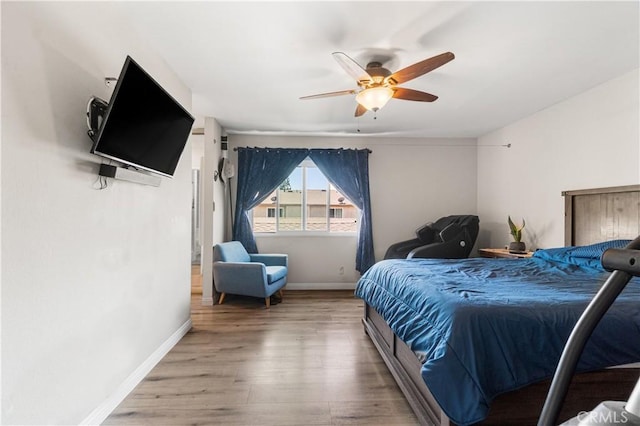 5950 Imperial Hwy Unit 48, South Gate, CA 90280 - bedroom featuring wood finished floors, baseboards, and ceiling fan