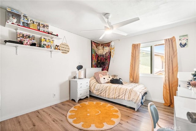 5950 Imperial Hwy Unit 48, South Gate, CA 90280 - bedroom with light wood-style floors, baseboards, and ceiling fan