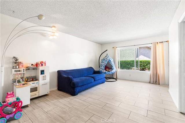 5950 Imperial Hwy Unit 48, South Gate, CA 90280 - living room with a textured ceiling