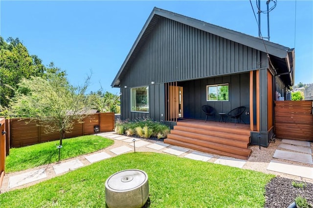 2240 Ewing St, Los Angeles, CA 90039 - back of property featuring board and batten siding and a gate