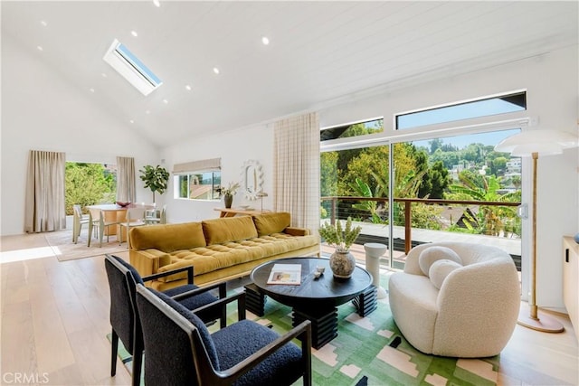 2240 Ewing St, Los Angeles, CA 90039 - living area with a skylight, high vaulted ceiling, recessed lighting, and light wood-type flooring