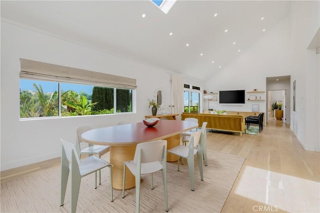 2240 Ewing St, Los Angeles, CA 90039 - dining area with high vaulted ceiling, recessed lighting, light wood-style flooring, and a skylight