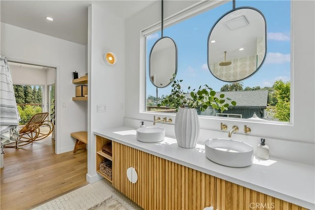 2240 Ewing St, Los Angeles, CA 90039 - bathroom featuring double vanity and wood finished floors