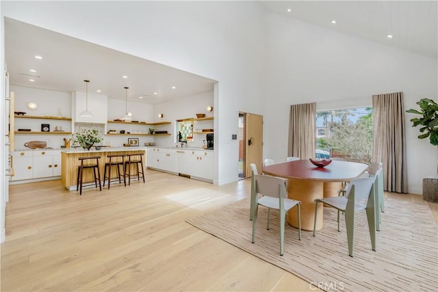 2240 Ewing St, Los Angeles, CA 90039 - dining area featuring light wood-type flooring, recessed lighting, and high vaulted ceiling