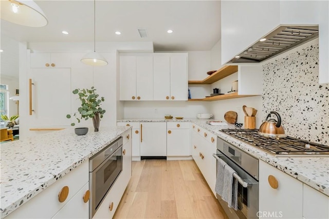 2240 Ewing St, Los Angeles, CA 90039 - kitchen with appliances with stainless steel finishes, light wood-style floors, premium range hood, white cabinets, and recessed lighting