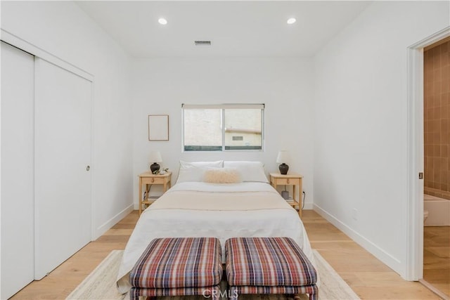 2240 Ewing St, Los Angeles, CA 90039 - bedroom featuring light wood-type flooring, recessed lighting, and a closet