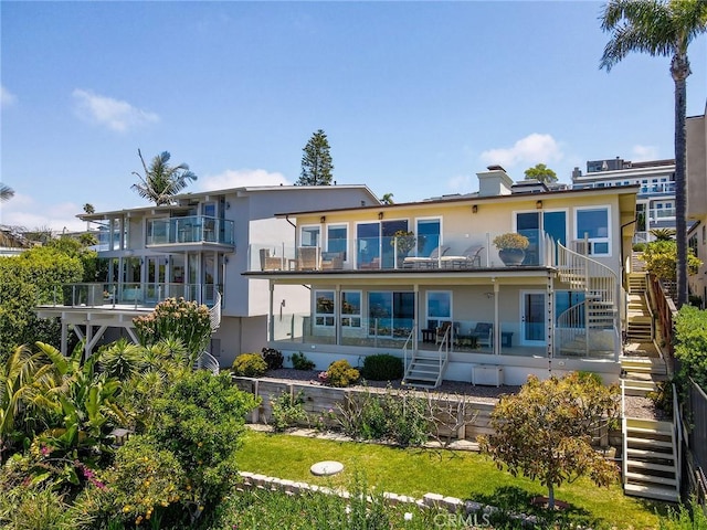 1155 Katella St, Laguna Beach, CA 92651 - back of house featuring stairway, stucco siding, and a balcony