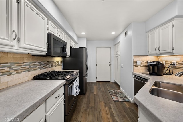 12909 Ternberry Ct, Tustin, CA 92782 - kitchen featuring black appliances, a sink, white cabinets, recessed lighting, and dark wood-type flooring