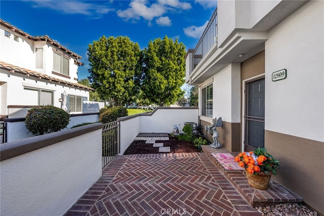 12909 Ternberry Ct, Tustin, CA 92782 - view of patio with a balcony
