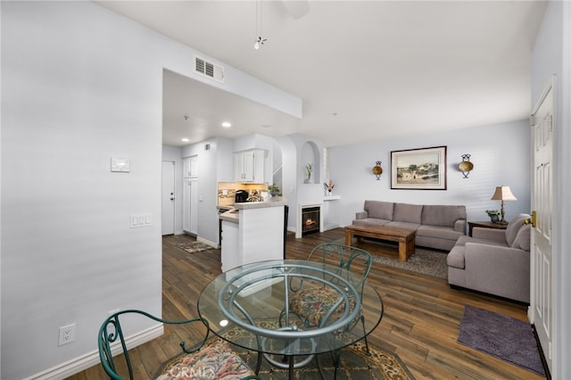 12909 Ternberry Ct, Tustin, CA 92782 - living area featuring dark wood-style flooring, a ceiling fan, baseboards, and recessed lighting