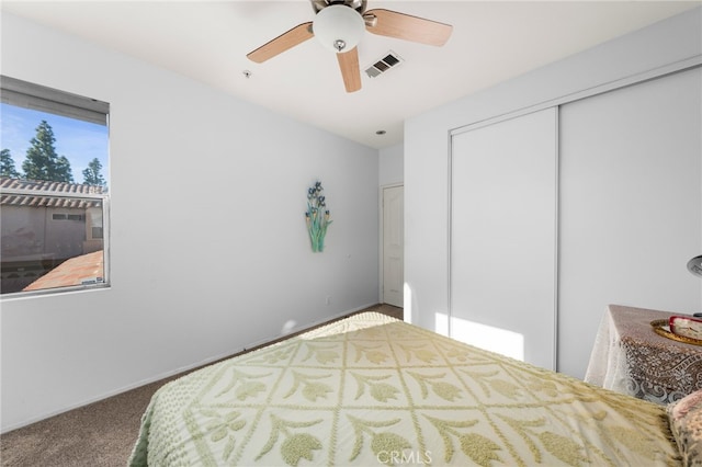 12909 Ternberry Ct, Tustin, CA 92782 - carpeted bedroom with a closet, a ceiling fan, and baseboards