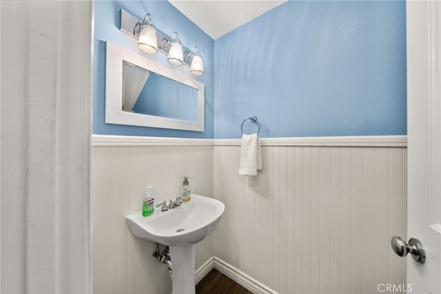 12909 Ternberry Ct, Tustin, CA 92782 - bathroom with wainscoting and wood finished floors