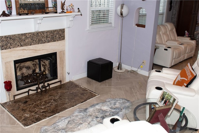 1831 W 68th St, Los Angeles, CA 90047 - living room with baseboards and a high end fireplace