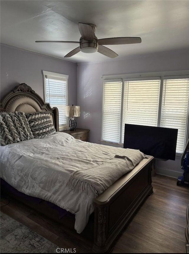 1831 W 68th St, Los Angeles, CA 90047 - bedroom with dark wood-style floors and ceiling fan