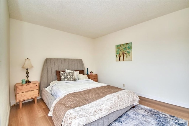 4838 Elrovia Ave Unit E, El Monte, CA 91732 - bedroom featuring light wood finished floors and baseboards