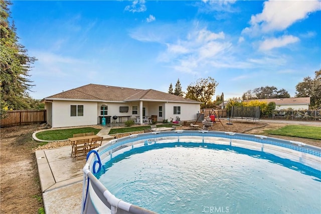 678 Colusa, Gridley, CA 95948 - view of swimming pool with a trampoline and a patio area