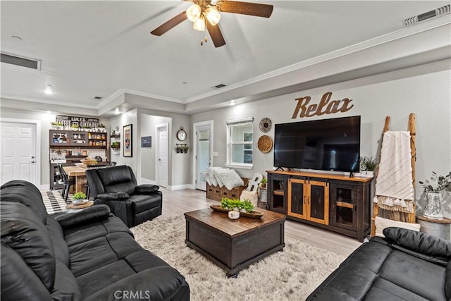 678 Colusa, Gridley, CA 95948 - living area with ceiling fan, wood finished floors, crown molding, and baseboards