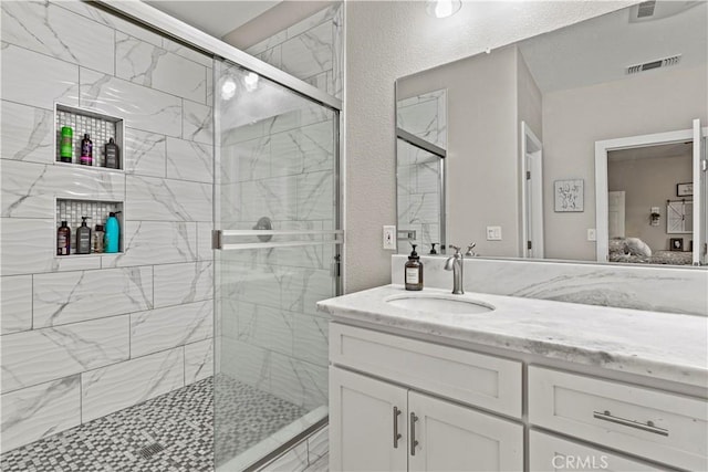 678 Colusa, Gridley, CA 95948 - ensuite bathroom featuring vanity and a shower stall