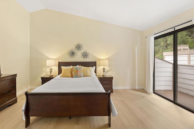 4535 Chateau Dr, San Diego, CA 92117 - bedroom with vaulted ceiling, light wood finished floors, access to exterior, and baseboards