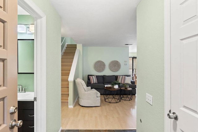 4535 Chateau Dr, San Diego, CA 92117 - living area featuring wood finished floors and stairs