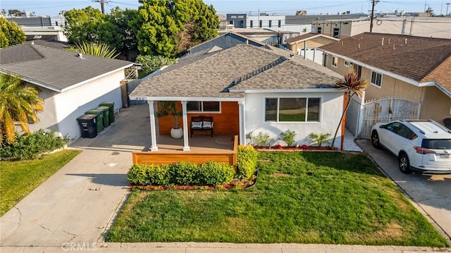4930 W 142nd St, Hawthorne, CA 90250 - ranch-style home with driveway, a shingled roof, a porch, a front yard, and stucco siding