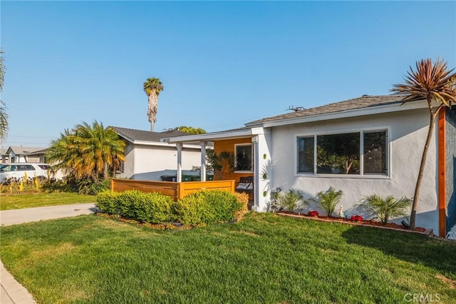 4930 W 142nd St, Hawthorne, CA 90250 - ranch-style house featuring stucco siding, a front lawn, and a porch